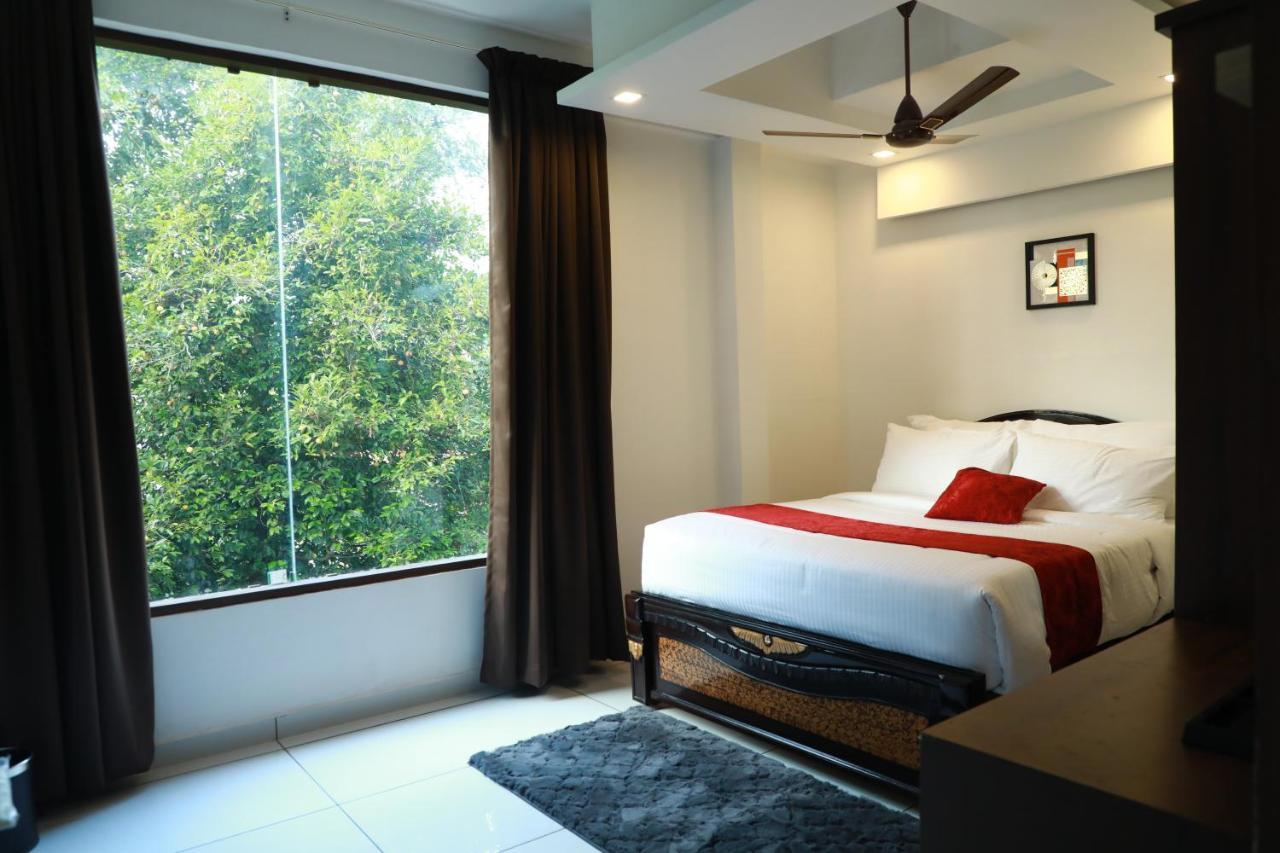 Achoos Residency Otel Tiruvalla Dış mekan fotoğraf