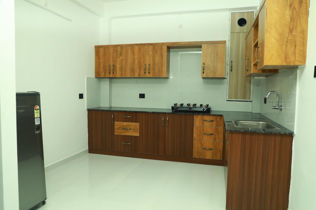 Achoos Residency Otel Tiruvalla Dış mekan fotoğraf
