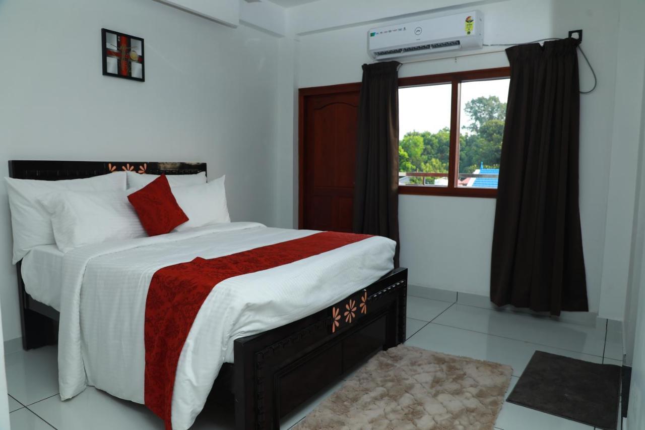 Achoos Residency Otel Tiruvalla Dış mekan fotoğraf