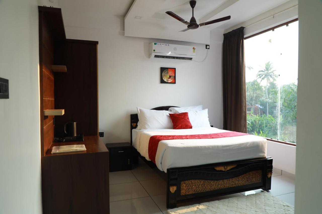 Achoos Residency Otel Tiruvalla Dış mekan fotoğraf